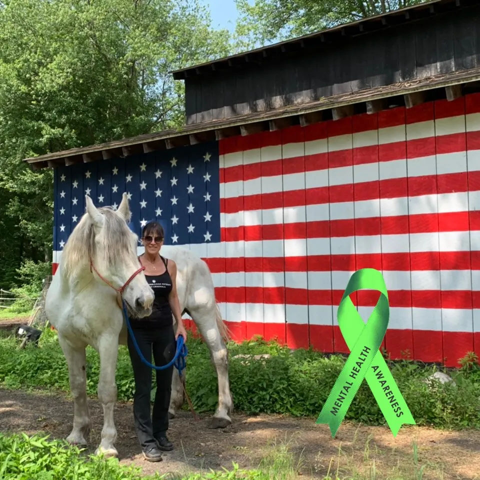 Client Standing Next to Horse