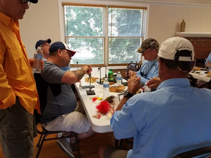 People Doing Activities at Table
